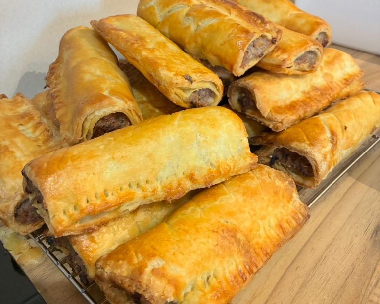 Savory pastry tarts filled with cheese, ham, and egg.