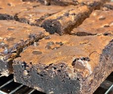 Close-up of freshly baked chocolate brownies with a rich, fudgy texture.