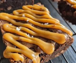 Close-up of freshly baked chocolate brownies with a rich, fudgy texture.